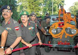 Officers pull the jeep carrying the GOC-in-C, Western Command, Lieut-Gen S. Pattabhiraman, on his departure to New Delhi, in Chandi Mandir on Thursday