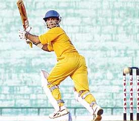 Deepak Joon of Bishnoi Cricket Club plays a shot against Minerva Cricket Academy in the final of the JP Atray Cricket Tournament at the PCA Stadium in Mohali on Thursday