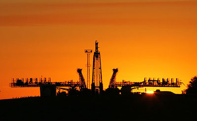 A silhouette of the launching pad for the Russian Soyuz TMA-7 rocket is seen against the rising sun at Baikonur Cosmodrome in Kazakhstan on Thursday