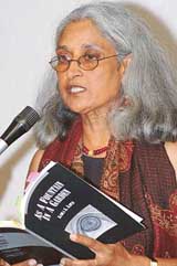 Indo-American poet and writer Kamla K. Kapur reads from her newly released book of poems, As a Fountain in a Garden, at a function in Chandigarh on Friday