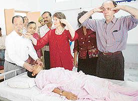  Australian doctors examine a patient at the Rattan Institute of Nursing and Ayurveda, Sohana, near Mohali, on Sunday.