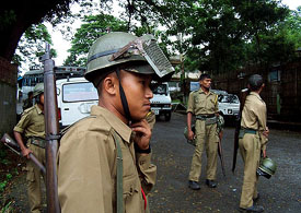 Security personnel patrol a street during a curfew in Tura town, 400 km west the Shillong, on Sunday