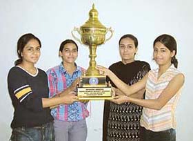 Students of Sri Sukhmani Institute of Engineering and Technology hold the Punjab Technical University Inter-College Badminton Tournament (women) trophy in Dera Bassi