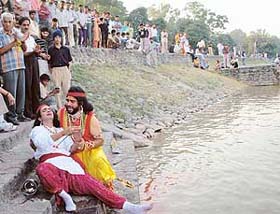 First day, first show: Shravan gasps for breath after being hit by an arrow of Dashrath during the enactment of a Ramlila scene on the first day of its staging at Sukhna Lake in Chandigarh