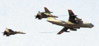 Three Indian Air Force fighter planes flying past during a rehearsal for the forthcoming Air Force Day celebrations in the Capital on Monday