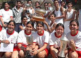 Winners after receiving trophies at the 158th annual athletics meet at Lawrence School, Sanawar, in Solan district on Monday. 