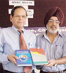 The Panjab University Vice-Chancellor, Prof K.N. Pathak, releases books by Col D.S. Cheema at DAV College, Chandigarh