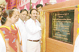 Mr S.K. Sharma, Commissioner, Municipal Corporation, lays the foundation stone of a renovation project for Maharaja Agrasen Park in Ludhiana on Tuesday. 
