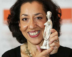 British author Andrea Levy poses for a photograph with the trophy after winning the Orange Prize for her book Small Island