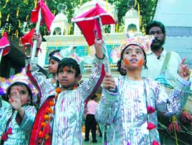 Children in langoor costume at the Langoorwala Mela
