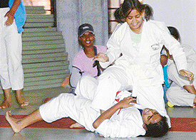 Surbhi of Chandigarh region exults after winning the 54 kg to 59 kg bout during the National Sports Meet of Kendriya Vidyalayas at Sector 42, Chandigarh, on Wednesday. 