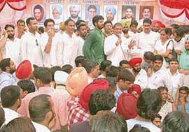 President of the All-India Youth Congress Ashok Tanwar addresses party workers at a rally in Ludhiana on Wednesday.