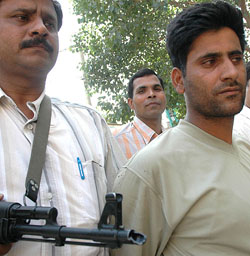 Mustuq Ahmad, a Hizbul Mujahideen militant arrested by the special cell of the Delhi Police in New Delhi on Wednesday. 