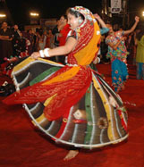 A woman performs 'ras garba' during the ongoing Navratri festival celebrations in Mumbai
