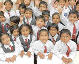 Reaching for the stars: Slum kids at their first day in school at KB DAV Senior Secondary School, Sector 7