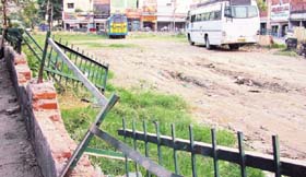 The park near the bus stand has been converted into a parking space for private buses