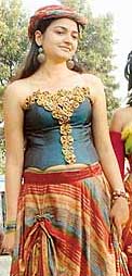 A NIIFT student on way to exhibit her new dress.