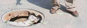 The uncovered manhole