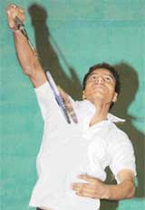 Jaswinder of DAV School, Amritsar, smashes his way to victory in the badminton title of the All-India Mahatma Hansraj Aryan Tournament at Sector 42 indoor hall on Saturday.