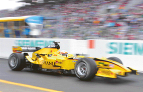 Narain Karthikeyan drives his Jordan during the qualifying session for the Japanese Grand Prix at the Suzuka circuit on Saturday. Karthikeyan finished a season-best 11th.