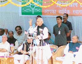 Mr L.K. Advani, President of the BJP, addresses a public meeting at Palampur on Sunday. Mr Shanta Kumar and Mr Prem Kumar Dhumal, former Himachal Chief Ministers, are also seen in the picture.