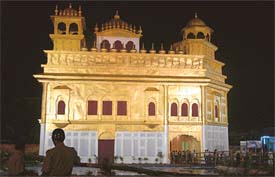 A view of a pandal, a lookalike of the Golden Temple, Amritsar, erected in the Sealdah area of Kolkata on the occasion of Durga Puja festival, which began on Sunday