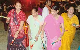 Women take part in the dandia festival at Fort Ramgarh, near Panchkula, on the occasion of Navratra
