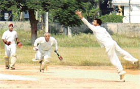 A cricket match between Municipal Corporation Club and Raman XI in progress in Ludhiana on Sunday