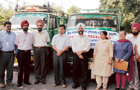 Mr Anurag Verma. Deputy Commissioner and district administration officials with relief material which was sent for the earthquake victims in Jammu and Kashmir on Monday