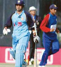 Sachin Tendulkar of India Seniors walks back after his dismissal during their match against India A in the Challenger Trophy at Mohali on Monday