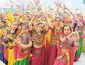 Children perform dandiya at Love Dale School, Ludhiana, on Tuesday to mark Ashtami puja