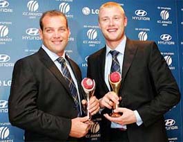 South Africas Jacques Kallis and Englands Andrew Flintoff hold their trophies during a press conference at the International Cricket Council Awards in Sydney