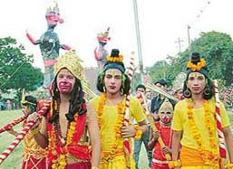 Artistes get ready for the final show on Dasehra organised by the Saraswati Dasehra Committee in Sector 24, Chandigarh, on Wednesday.