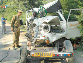 The ill-fated Mahindra pick-up van that collided with an HRTC bus near Chakki Ka Mor, killing seven persons on the spot on the Kalka-Shimla Highway on Wednesday
