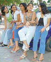 SIMPLY CHIC: The accent is on ankles and as city girls flaunt their folded pants.