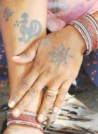 TATTOOS: Modern and traditional.