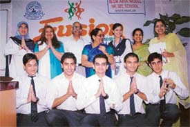 Pakistani students interact with faculty members of BCM School in Ludhiana on Thursday
