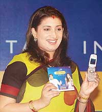 TV artist Smriti Irani poses at the launch of Tata Indicom non-stop mobile range of handsets at a press conference in New Delhi on Friday. Tata Indicom allows customers to get free incoming calls for two years. Subscribers are free to recharge with any recharge voucher, starting at Rs 50. 