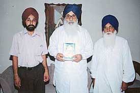 Former Punjab Chief Minister Parkash Singh Badal releases a book in Chandigarh on Friday