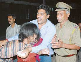The mother of the victim weeps inconsolably at the Civil Hospital, Ambala, on Friday.