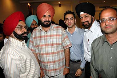 Navjot Singh Sidhu poses with his admirers.