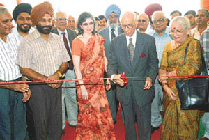 Justice R.S. Pathak, President, The Tribune Trust, inaugurates the printing press in Jalandhar on Friday.