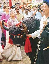 Mrs Gursharan Kaur, wife of Prime Minister Manmohan Singh, watches a folk performance at the inauguration of the welfare exhibition on the 44th Raising Day of the ITBP in New Delhi