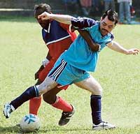 A football match going on between the Youngsters Club and the Chandigarh Police Club at the Football Ground, Sector 17, in Chandigarh on Saturday