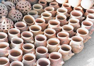 Women buy new karvas on Karva Chauth and paint them with beautiful motifs