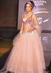 A model displays an Indian designer's creation during a fashion show in New Delhi on Sunday.