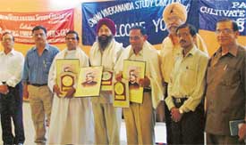 At a function on the 112th anniversary of Swami Vivekananda’s Chicago address, Mr Sarabjit Singh, Mr J.C. Joshi and Rev Father Daniel are honoured by members of the Vivekananda Study Circle on Sunday