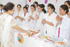 G.C.G. Principal G.K. Jaggi inaugurates the food festival on the World Food Day celebration on the college campus in Patiala