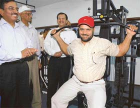 KEEPING FIT: Former World Body-building Champion Prem Chand Dogra checks out the gymnasium at the AG (Audit), Haryana, office in Sector 33