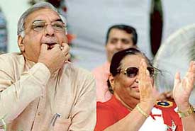 Haryana Chief Minister Bhupinder Singh Hooda blows a whistle to sound the AIDS alert during Goonj in Chandigarh on Tuesday